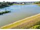 Enjoy serene lake views from this picturesque waterfront property at 6047 Twin Bridges Dr, Zephyrhills, FL 33541