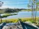 Stunning view of a serene lake from backyard at 6047 Twin Bridges Dr, Zephyrhills, FL 33541