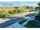 Quiet residential street with ample parking and beautiful landscaping at 6047 Twin Bridges Dr, Zephyrhills, FL 33541
