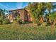 Screened patio and lush landscaping in the backyard at 613 Tanana Fall Dr, Ruskin, FL 33570