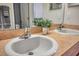 Clean bathroom with a double vanity and neutral tones at 613 Tanana Fall Dr, Ruskin, FL 33570