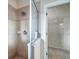 Bathroom with shower stall and access to a walk-in closet at 613 Tanana Fall Dr, Ruskin, FL 33570
