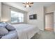 Bedroom with a ceiling fan and large window at 613 Tanana Fall Dr, Ruskin, FL 33570