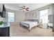 Spacious bedroom with a king-size bed and lots of natural light at 613 Tanana Fall Dr, Ruskin, FL 33570
