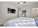 Bedroom with large TV and walk-in closet at 613 Tanana Fall Dr, Ruskin, FL 33570