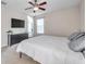 King bedroom with private door to backyard patio at 613 Tanana Fall Dr, Ruskin, FL 33570