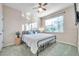 Bright bedroom with a ceiling fan and large window at 613 Tanana Fall Dr, Ruskin, FL 33570
