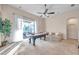 Game room featuring a pool table and sliding glass doors at 613 Tanana Fall Dr, Ruskin, FL 33570