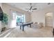 Game room with pool table and access to patio at 613 Tanana Fall Dr, Ruskin, FL 33570