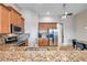 Kitchen with stainless steel appliances and granite countertops at 613 Tanana Fall Dr, Ruskin, FL 33570