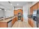 Modern kitchen with stainless steel appliances and granite countertops at 613 Tanana Fall Dr, Ruskin, FL 33570