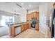 Kitchen with stainless steel appliances and granite countertops at 613 Tanana Fall Dr, Ruskin, FL 33570