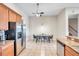 Kitchen with stainless steel appliances and granite countertops at 613 Tanana Fall Dr, Ruskin, FL 33570