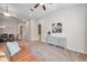 Light and airy living room with a view of the dining area at 613 Tanana Fall Dr, Ruskin, FL 33570