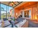Outdoor patio with seating area and view of the pool table at 613 Tanana Fall Dr, Ruskin, FL 33570