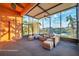 Spacious screened porch with lake view and outdoor grill at 613 Tanana Fall Dr, Ruskin, FL 33570