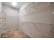 Large walk-in closet with wire shelving for ample storage at 613 Tanana Fall Dr, Ruskin, FL 33570