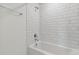 Clean bathroom with white subway tile and bathtub at 6229 Golden Beach Dr, Apollo Beach, FL 33572