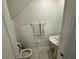 Clean bathroom with pedestal sink and toilet at 6300 Beverly Hills Dr, Zephyrhills, FL 33541