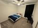 Cozy bedroom with ceiling fan and window coverings at 6300 Beverly Hills Dr, Zephyrhills, FL 33541