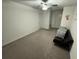 Spacious bedroom with carpeted floors and a sofa at 6300 Beverly Hills Dr, Zephyrhills, FL 33541