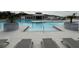Resort-style pool with spa and lounge chairs at 6300 Beverly Hills Dr, Zephyrhills, FL 33541