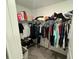 Large walk-in closet with shelving and hanging rods at 6300 Beverly Hills Dr, Zephyrhills, FL 33541