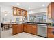 Cozy kitchen with views of the adjacent dining area and waterfront scenery at 7233 15Th Ne Ct, St Petersburg, FL 33702