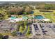 Aerial view of community clubhouse and parking lot at 9214 Golf View Dr, New Port Richey, FL 34655