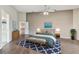 Spacious bedroom with wood floors and large windows at 9214 Golf View Dr, New Port Richey, FL 34655