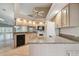Bright kitchen with white appliances and granite countertops at 9214 Golf View Dr, New Port Richey, FL 34655