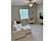 Living room with sectional sofa and tile floors at 13621 Willow Bluestar Loop, Riverview, FL 33579