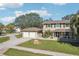 Two-story house with a two-car garage and large yard at 13945 75Th Ave, Seminole, FL 33776