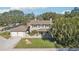 Two-story house with a two-car garage and large yard at 13945 75Th Ave, Seminole, FL 33776