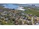 Aerial view showcasing waterfront homes and lush landscaping at 13945 75Th Ave, Seminole, FL 33776