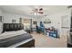 Bright bedroom with a double bed and built-in workspace at 13945 75Th Ave, Seminole, FL 33776