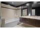 Spa-like bathroom with double vanity and walk-in shower at 175 1St S St # 3402, St Petersburg, FL 33701