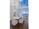 Modern dining room with long table and sunset views at 175 1St S St # 3402, St Petersburg, FL 33701