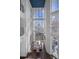 Elegant dining area with two-story high ceilings and city views at 175 1St S St # 3402, St Petersburg, FL 33701