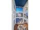Open floor plan living area with curved sofa and double-height ceilings at 175 1St S St # 3402, St Petersburg, FL 33701