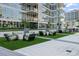 Spacious outdoor lounge with comfortable seating and green artificial turf at 175 1St S St # 3402, St Petersburg, FL 33701