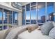 Spacious main bedroom with city views and luxurious bedding at 175 1St S St # 3402, St Petersburg, FL 33701