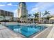 Resort-style pool with surrounding lounge chairs and building views at 175 1St S St # 3402, St Petersburg, FL 33701