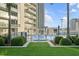 Refreshing pool area with lounge chairs and lush landscaping at 175 1St S St # 3402, St Petersburg, FL 33701