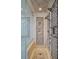Large walk-in shower with pebble floor and multiple shower heads at 175 1St S St # 3402, St Petersburg, FL 33701
