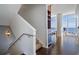 Modern staircase with metal railing leading to upper level, water view at 175 1St S St # 3402, St Petersburg, FL 33701
