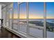 Expansive window showcasing scenic water views and cityscape at sunset at 175 1St S St # 3402, St Petersburg, FL 33701