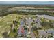 Aerial view of home and golf course community at 2438 Sifield Greens Way # 44, Sun City Center, FL 33573