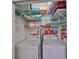 Convenient laundry room with washer, dryer, and ample shelving at 2438 Sifield Greens Way # 44, Sun City Center, FL 33573