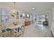 Living and dining room, hardwood floors, golf course view at 2438 Sifield Greens Way # 44, Sun City Center, FL 33573